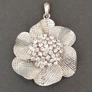 Oversized flower pendant with clustered crystals